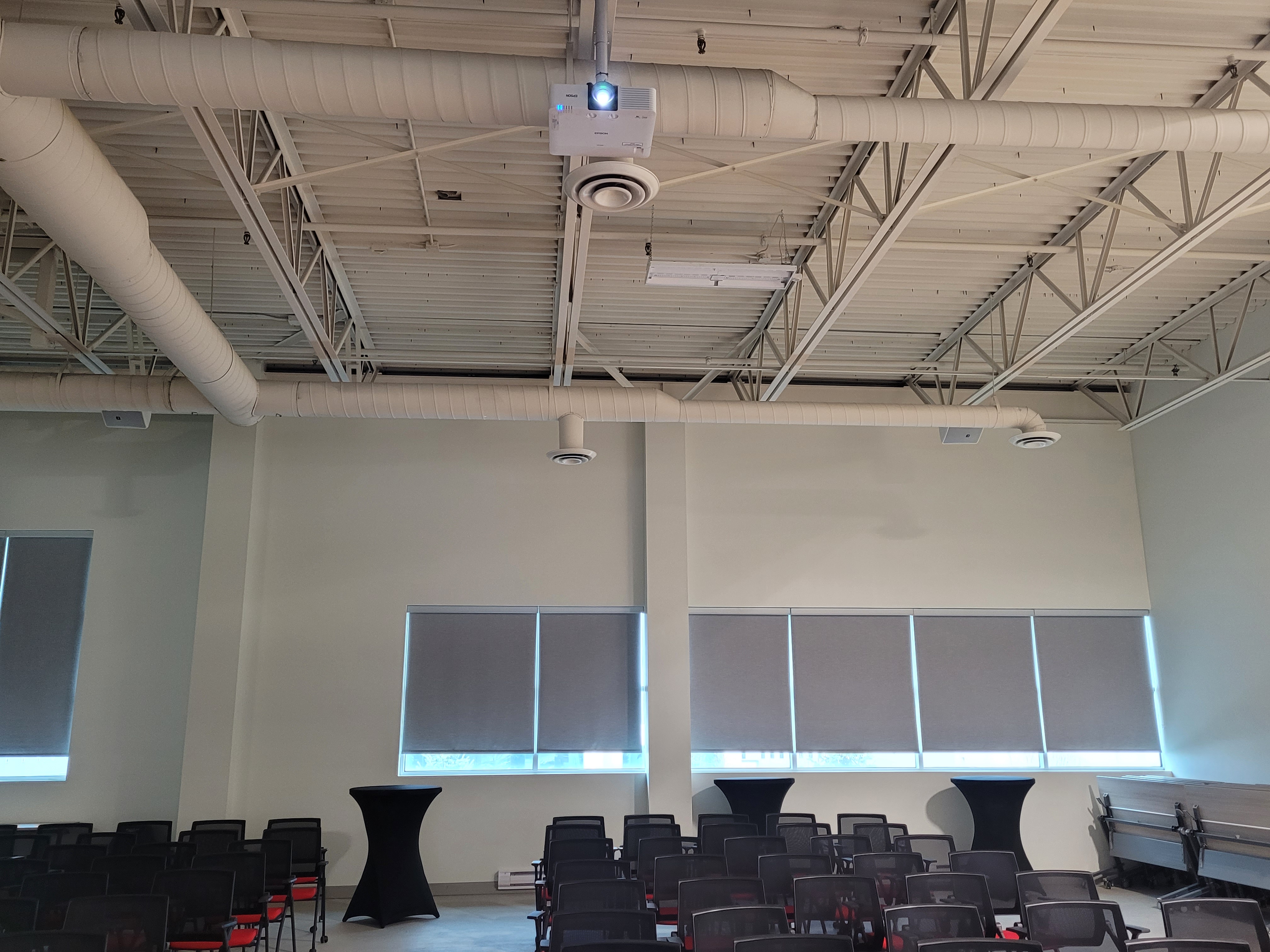 Audio-video equipment mounted and configured in a commercial space