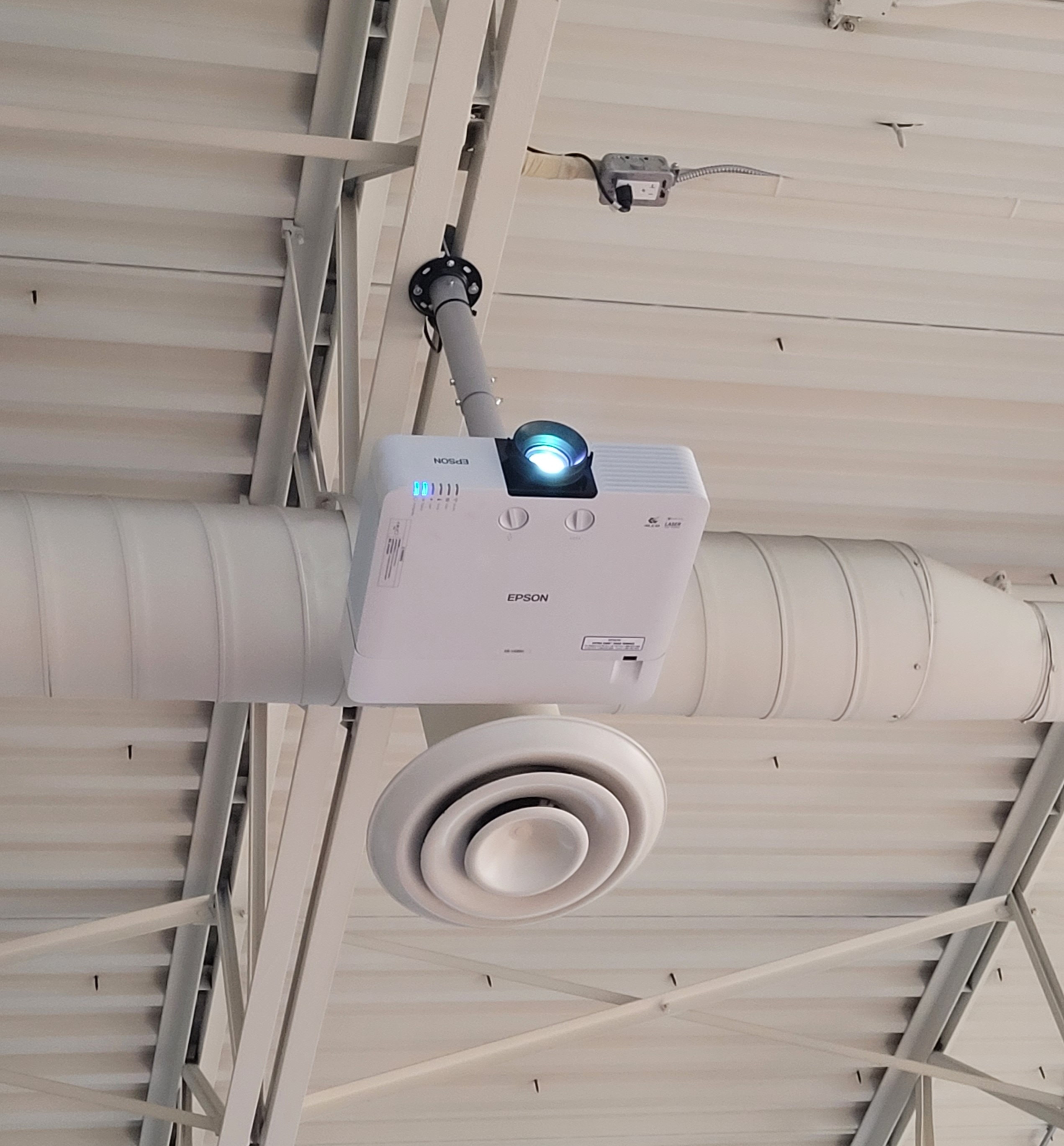 Commercial A/V system — speakers and displays installed